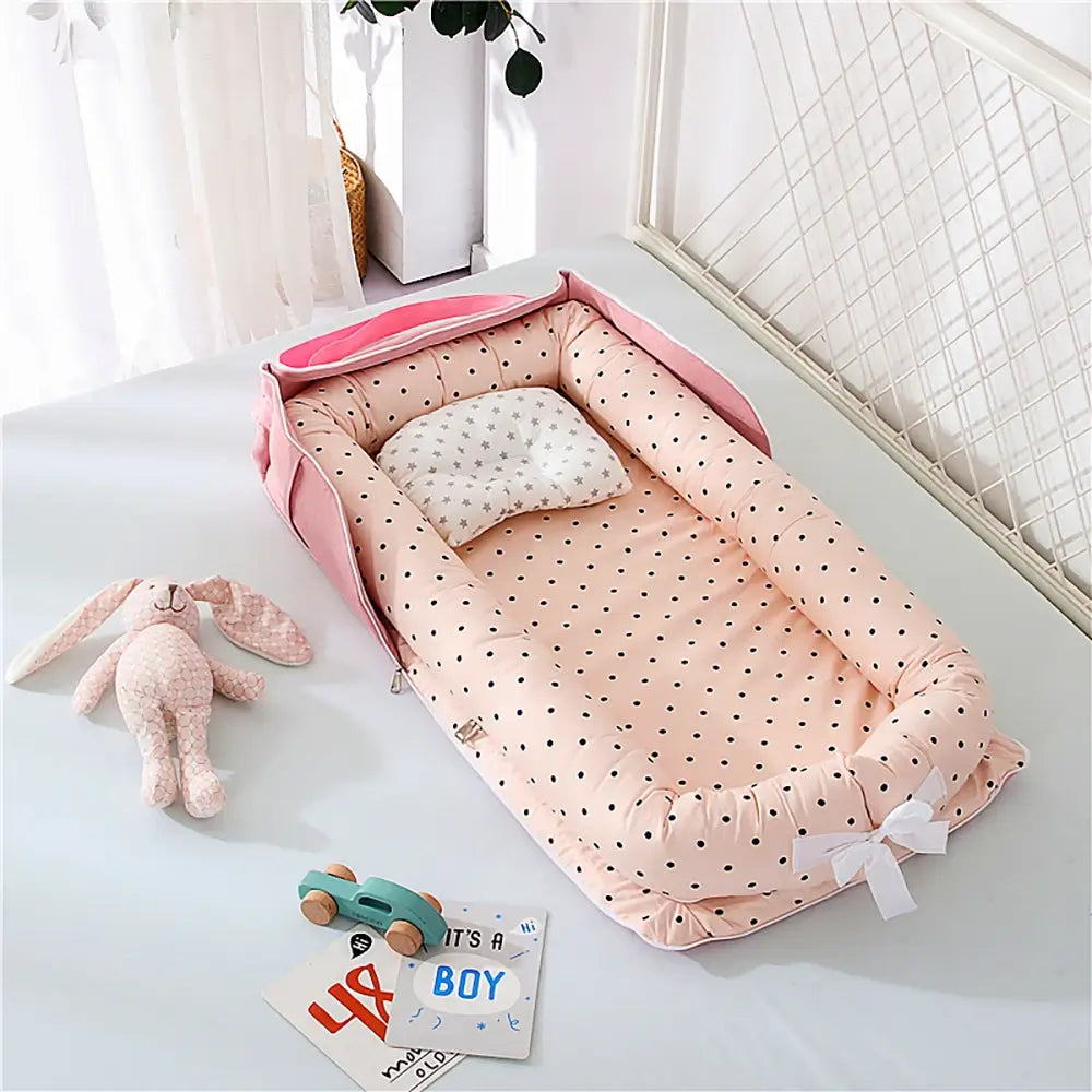 http://thetoddly.com/cdn/shop/files/Foldable-Baby-Nest-Lounger-Travel-Bed-For-Infants-Baby-Crib-for-Newborns-Portable-Baby-Crib-Baby-Bed-for-0-12-Months-Old-Pink-Dots-TheToddly.p8.webp?v=1687543120