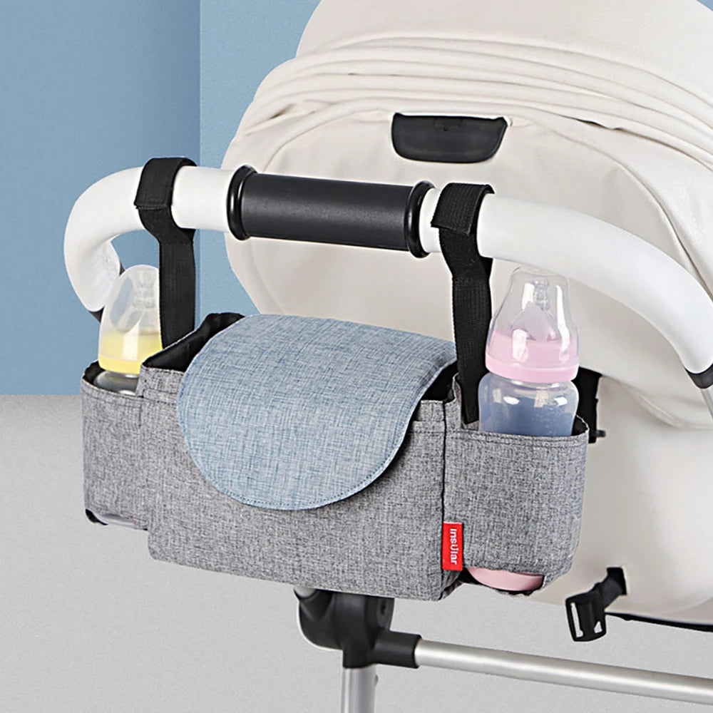 Ergonomic Stroller Organizer Bag - Diaper bag hanging on the baby stroller