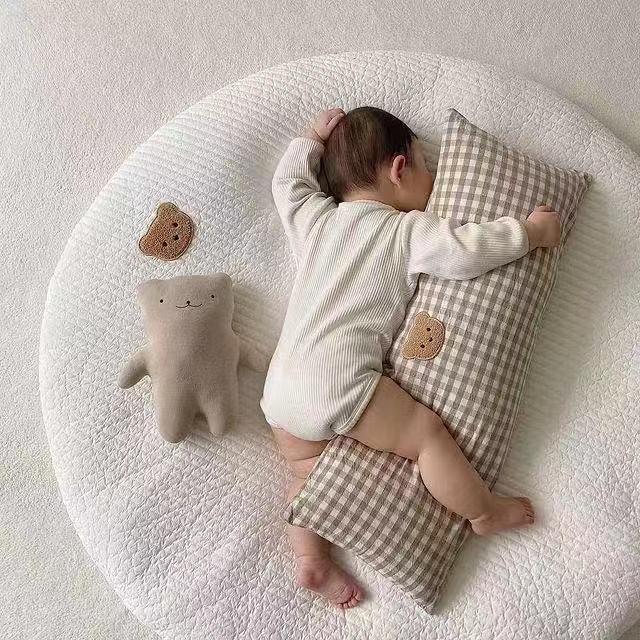 Baby Taking Nap on a Rectangular Baby Pillow