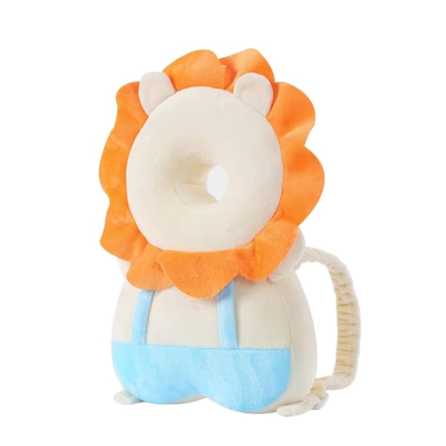Plush lion toy with an orange mane and blue shorts on a white background