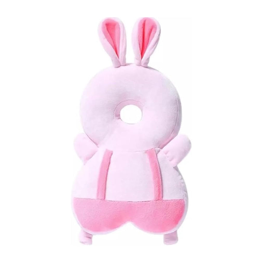 Pink bunny-shaped pillow on a white background