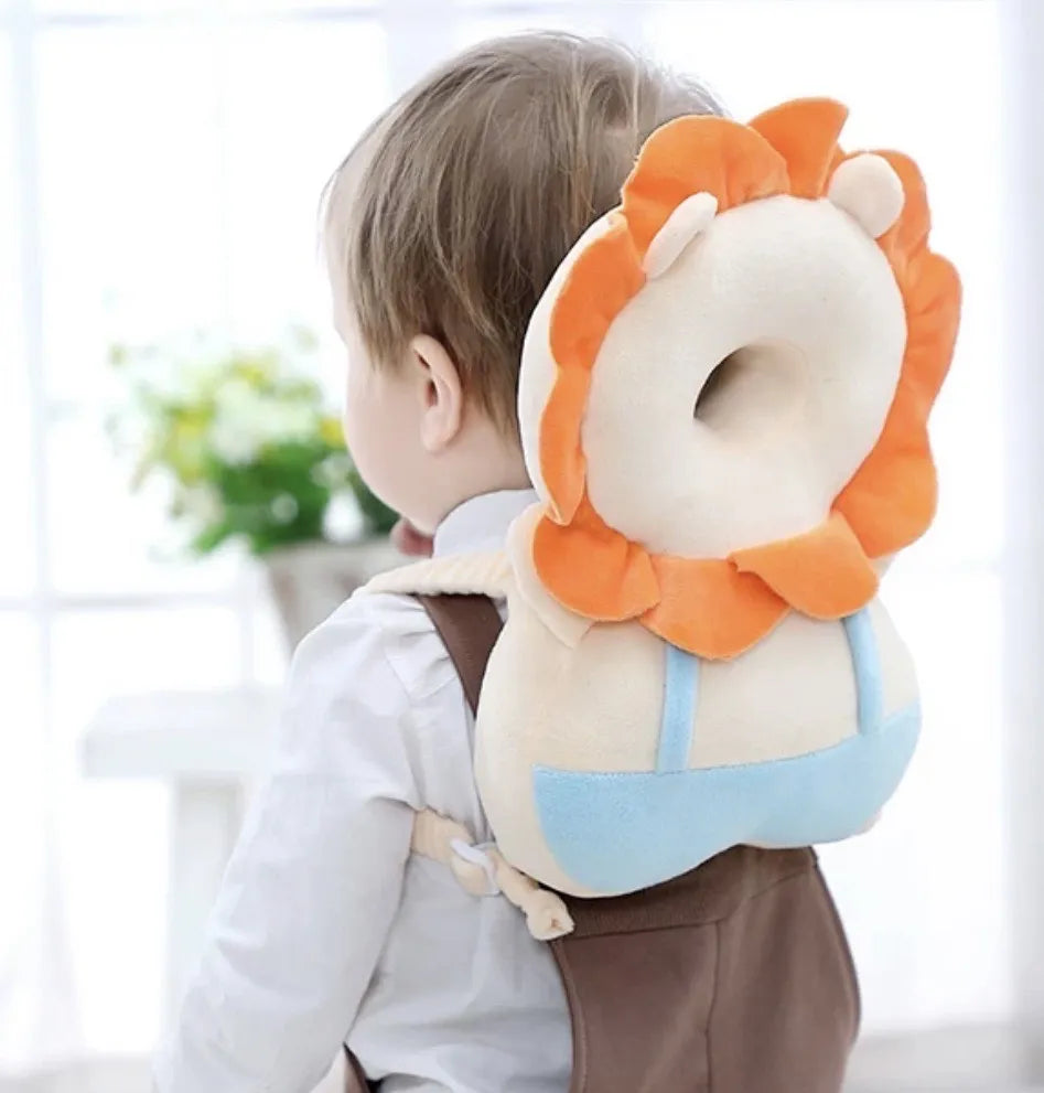 Child wearing a lion-shaped backpack with a blurred indoor background