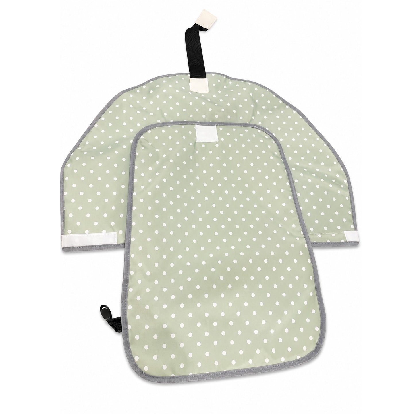 Green diaper changing mat with white polka dots and gray trim on a white background