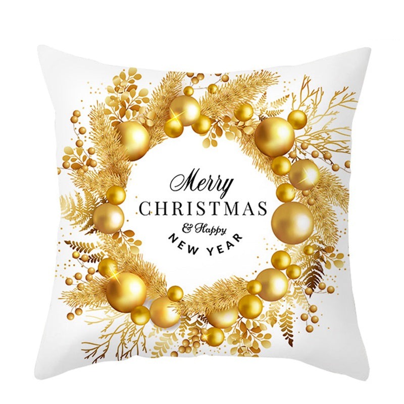 White cushion covers with golden Christmas prints