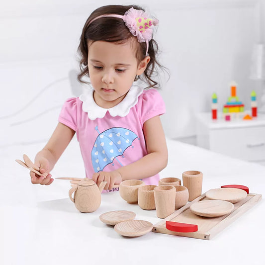 child pretend playing with coffee tea toy set