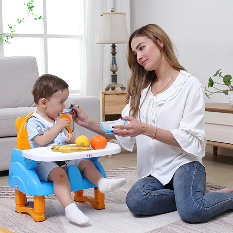 mom feeding baby foldable baby dining table dining chair baby chair